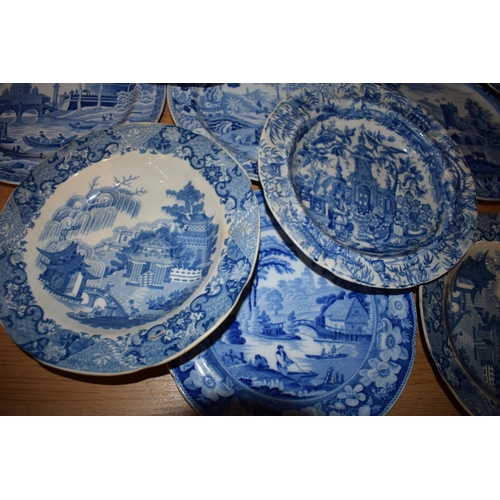 132P - A large and interesting collection of 19th century blue and white plates to include Spode 'The Commo... 