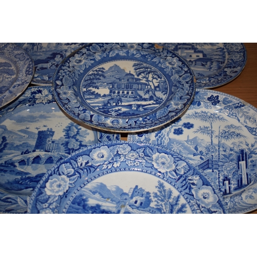 132P - A large and interesting collection of 19th century blue and white plates to include Spode 'The Commo... 