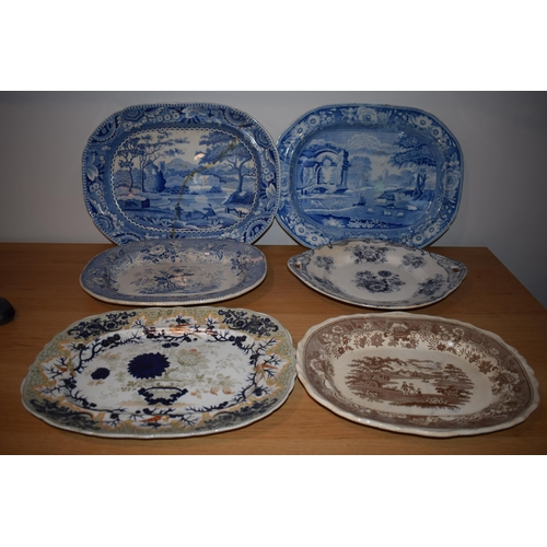 132R - A collection of 19th century large blue and white platters to include a castle scene, thought to be ... 