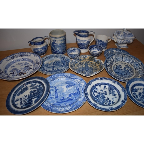 132S - 19th century blue and white pottery to include a Brameld Boys Fishing jar (missing lid), jugs, a tur... 