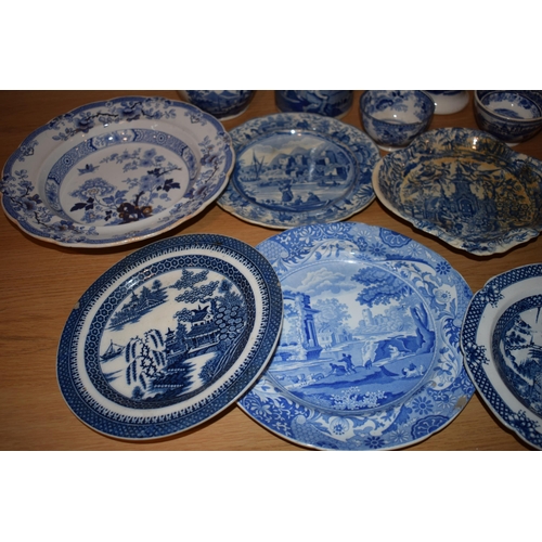 132S - 19th century blue and white pottery to include a Brameld Boys Fishing jar (missing lid), jugs, a tur... 