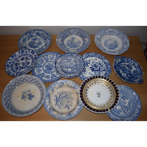 132U - 19th century blue and white transfer ware to include a Davenport armorial plate, dishes, plates and ... 