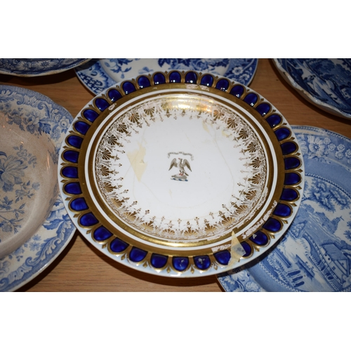 132U - 19th century blue and white transfer ware to include a Davenport armorial plate, dishes, plates and ... 