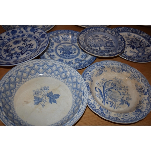 132U - 19th century blue and white transfer ware to include a Davenport armorial plate, dishes, plates and ... 