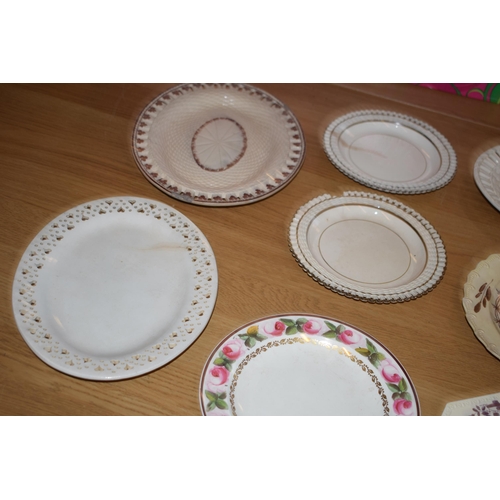 132Y - 19th century creamware pottery to include pierced ware plates and baskets with serving platters.