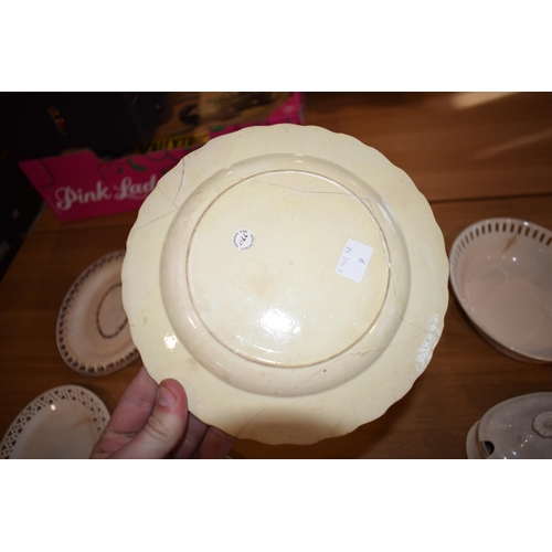 132Y - 19th century creamware pottery to include pierced ware plates and baskets with serving platters.