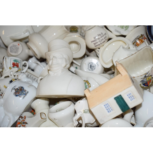 136 - A collection of crested china items to include animals, jugs, vases and varying forms and decoration... 