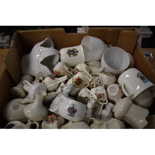 136 - A collection of crested china items to include animals, jugs, vases and varying forms and decoration... 