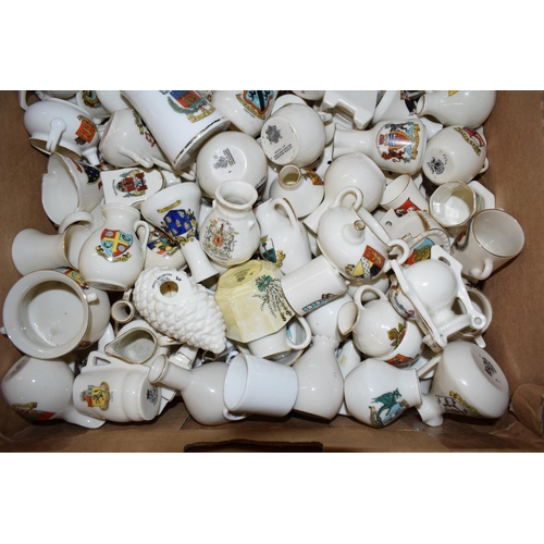 137 - A collection of crested china items to include animals, jugs, vases and varying forms and decoration... 