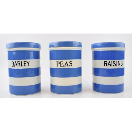 139 - Three T. G Green storage jars with original lids, 'RASINS' 'BARLEY' and 'PEAS'. Height 17.5cm.