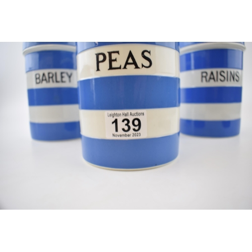 139 - Three T. G Green storage jars with original lids, 'RASINS' 'BARLEY' and 'PEAS'. Height 17.5cm.