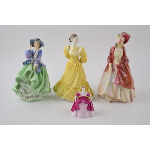 150B - Royal Doulton figurines to include The Paisley Shawl HN1392, Top o'the Hill HN1833 in green colourwa... 