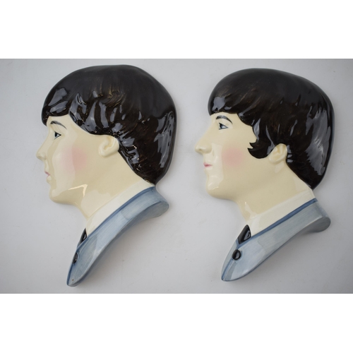 22A - Moorland Pottery Beatles face wall plaques: Lennon and McCartney (2), 15cm tall.