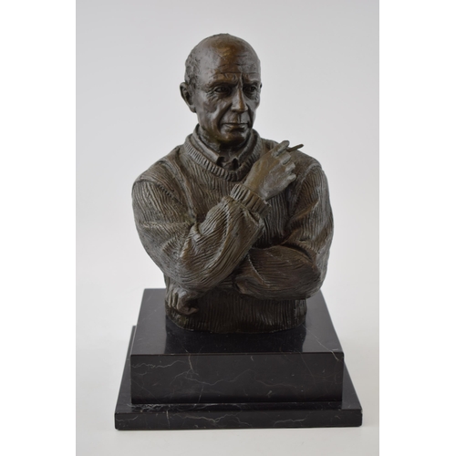 481 - Bronze bust of Pablo Picasso, mounted onto black marble base, signed 'Milo', 34cm tall.