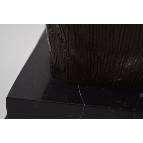 481 - Bronze bust of Pablo Picasso, mounted onto black marble base, signed 'Milo', 34cm tall.