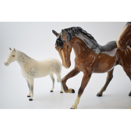 62F - Beswick horses to include brown shire 818, grey thoroughbred (13cm tall), a brown gloss Spirit of Fr... 