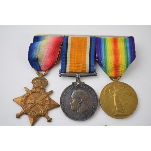 472 - A trio of World War One medals to include 1914-1915 star, the 1914-1918 medal and the Great War for ... 