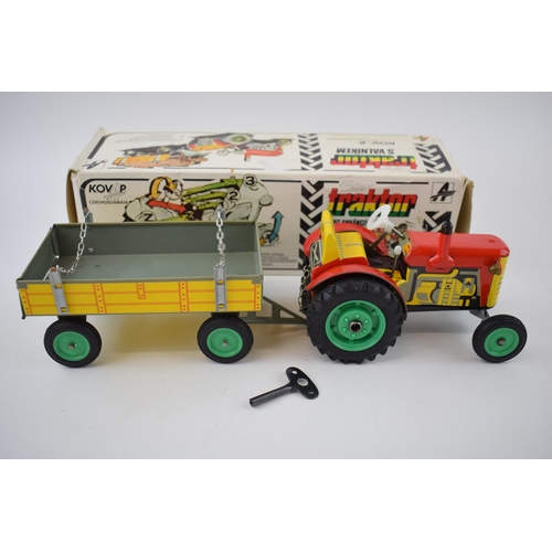 488 - Boxed Zetor Traktor / Tractor and trailer, Kovap Czechoslovakia, in red colourway, with yellow trail... 