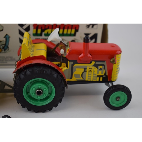 488 - Boxed Zetor Traktor / Tractor and trailer, Kovap Czechoslovakia, in red colourway, with yellow trail... 