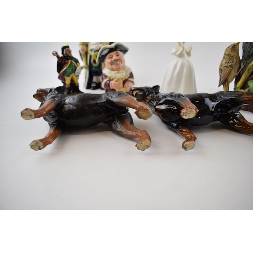 149A - A collection of ceramic items to include Two Royal Doulton Rottweiler dogs, a black and white cat, a... 