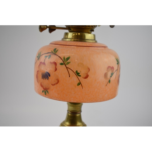 494 - Antique oil lamp 'Made in England' decorative fluted brass stand mounted on ceramic base, mottled op... 