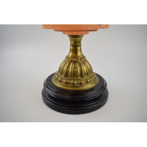 494 - Antique oil lamp 'Made in England' decorative fluted brass stand mounted on ceramic base, mottled op... 