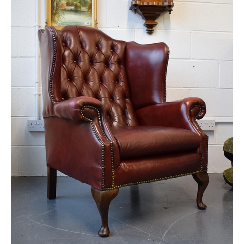 495 - Vintage leather Queen Anne style Chesterfield single wingback chair in oxblood. A good example of a ... 