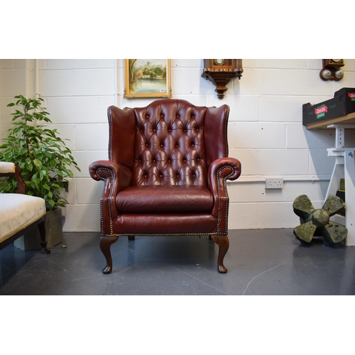 495 - Vintage leather Queen Anne style Chesterfield single wingback chair in oxblood. A good example of a ... 