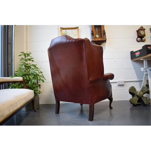 495 - Vintage leather Queen Anne style Chesterfield single wingback chair in oxblood. A good example of a ... 