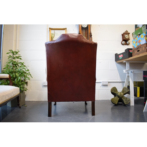 495 - Vintage leather Queen Anne style Chesterfield single wingback chair in oxblood. A good example of a ... 