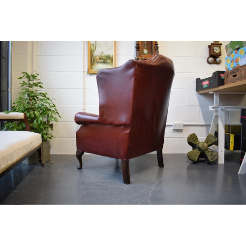 495 - Vintage leather Queen Anne style Chesterfield single wingback chair in oxblood. A good example of a ... 