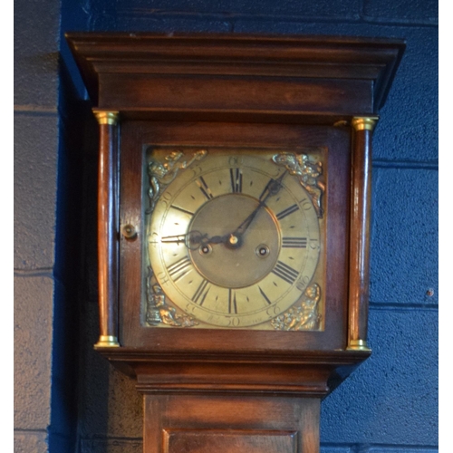 496 - Grandfather clock by Hampson of Wrexham, 1436. Brass dial with roman numerals. Oak case with brass f... 