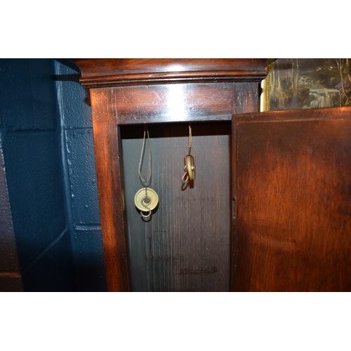 496 - Grandfather clock by Hampson of Wrexham, 1436. Brass dial with roman numerals. Oak case with brass f... 