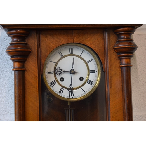 498 - Edwardian chiming Vienna Wall clock with ceramic dial with brass banding and roman numerals. Ceramic... 