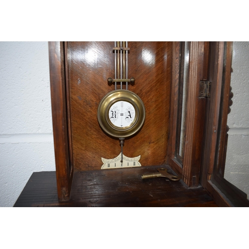 498 - Edwardian chiming Vienna Wall clock with ceramic dial with brass banding and roman numerals. Ceramic... 