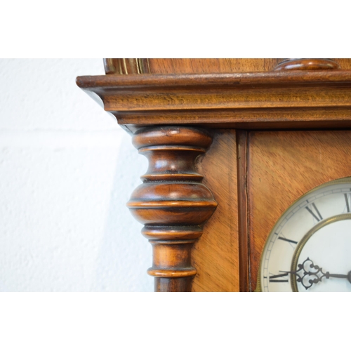 498 - Edwardian chiming Vienna Wall clock with ceramic dial with brass banding and roman numerals. Ceramic... 