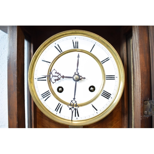 498 - Edwardian chiming Vienna Wall clock with ceramic dial with brass banding and roman numerals. Ceramic... 