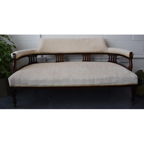 502 - Edwardian upholstered sofa / couch  on original casters. Recently reupholstered in a good quality cr... 