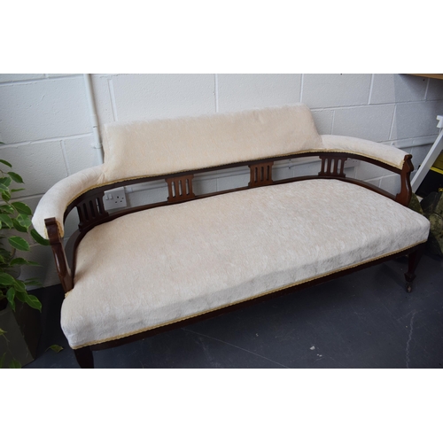 502 - Edwardian upholstered sofa / couch  on original casters. Recently reupholstered in a good quality cr... 