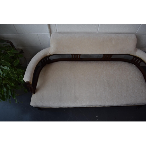 502 - Edwardian upholstered sofa / couch  on original casters. Recently reupholstered in a good quality cr... 