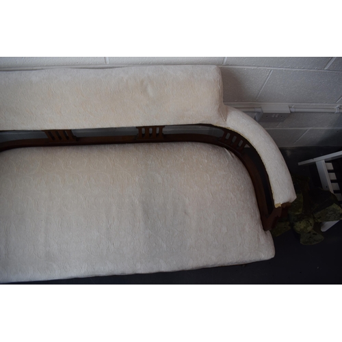 502 - Edwardian upholstered sofa / couch  on original casters. Recently reupholstered in a good quality cr... 