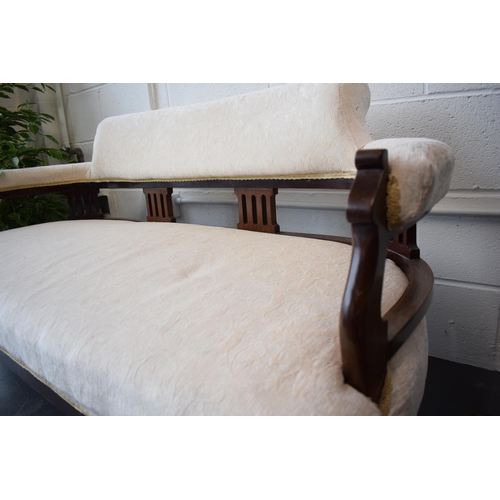 502 - Edwardian upholstered sofa / couch  on original casters. Recently reupholstered in a good quality cr... 