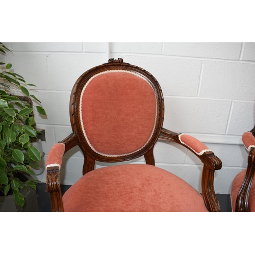 503 - Pair of Edwardian 'His and Hers'  salon chairs. Upholstered in a good quality pink fabric. Hand carv... 