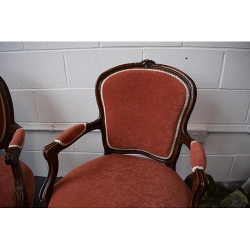 503 - Pair of Edwardian 'His and Hers'  salon chairs. Upholstered in a good quality pink fabric. Hand carv... 