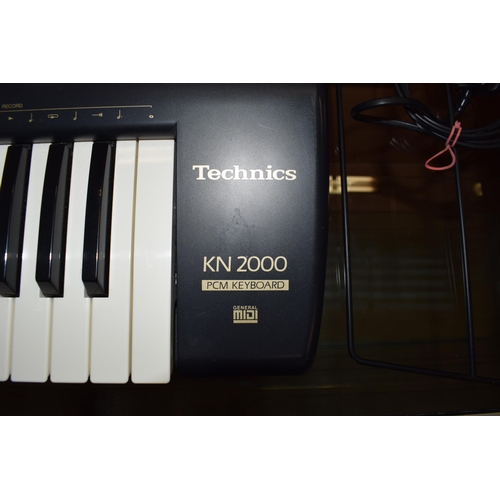 478A - Technics KN 2000 PCM Keyboard MIDI connectivity Made in Japan, In working order with music stand and... 