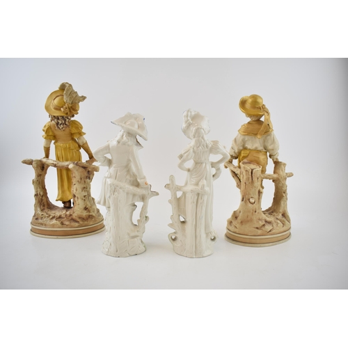 118 - A collection of continental pottery figures to include a pair of large figures in gold colour-way an... 