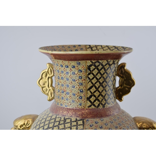 302 - Oriental two handled Satsuma-ware vase. Animal head handels with gilt decoration. Height 47cm.