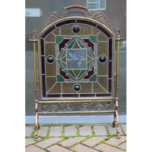 287 - Arts and Crafts firescreen with copper and brass decoration and stained glass insert with floral des... 