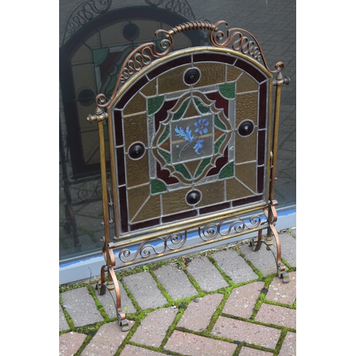 287 - Arts and Crafts firescreen with copper and brass decoration and stained glass insert with floral des... 