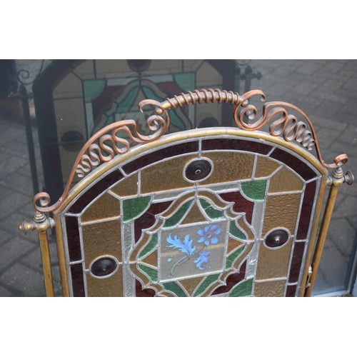 287 - Arts and Crafts firescreen with copper and brass decoration and stained glass insert with floral des... 